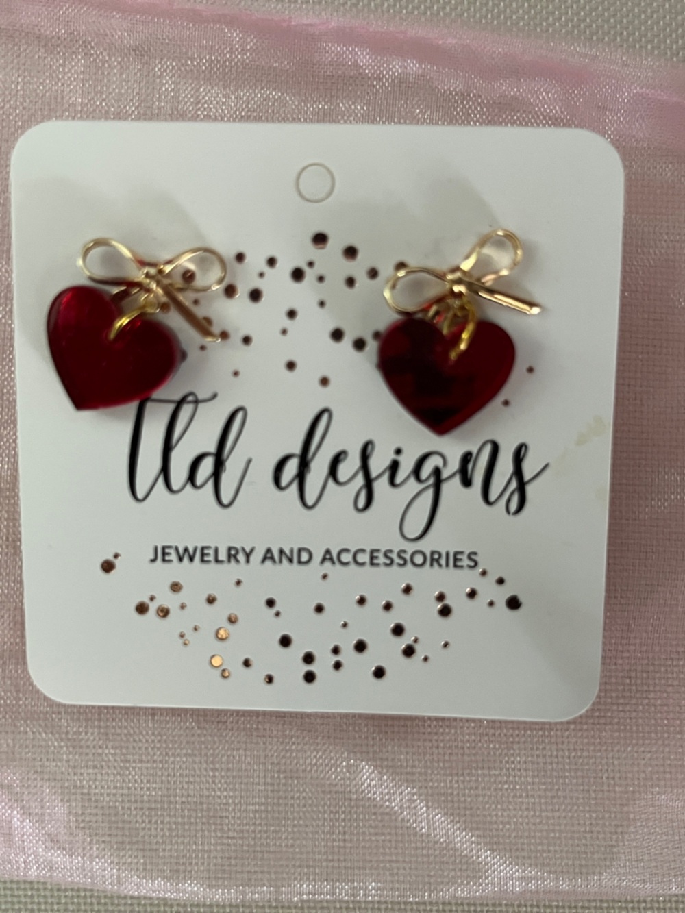 LTD Designs Red Heart Earrings with Gold Bow Accents.  Original packaging and ba